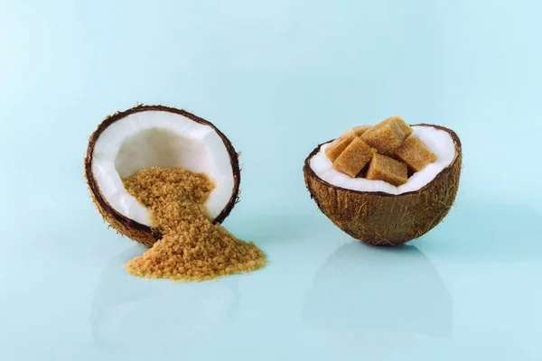 chopped coconut halves with coconut sugar inside.