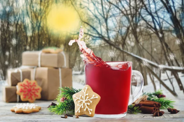 Mulled wine with flying ingredients to prepare it with gifts