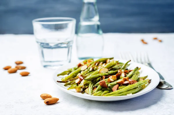 Roasted snap green beans with almond slices