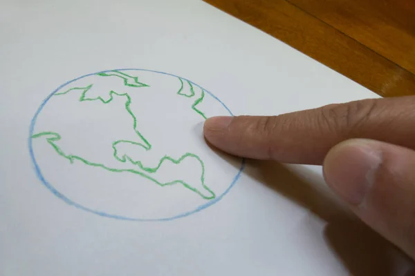 Finger Pointing Planet Earth Drawn Sheet Give Concept Pointing Destiny — Stock Photo, Image