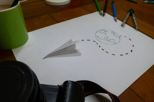 Planet Drawn Paper Plane Seen Another Angle Close Unfocused Camera — Stock Photo, Image