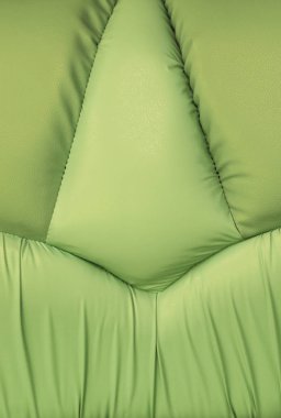 Yeşil deri kanepe dikiş doku ile ve arka planlar