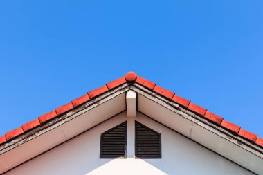 Gable of a House on blue sky background