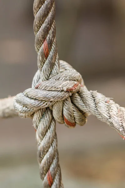 Old fishing boat rope with a Tied Knot — Stock Photo, Image