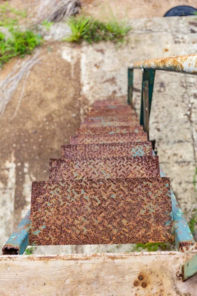 close up rusty iron stairs step