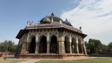 New Delhi, India - February 28 2025: Architecture view of Humayun's tomb ancient building with tourists. The tomb of Mughal Emperor Humayun is a popular historical site in delhi to visit.