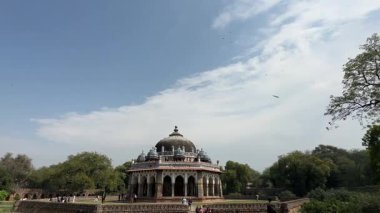 New Delhi, India - February 28 2025: Architecture view of Humayun's tomb ancient building with tourists. The tomb of Mughal Emperor Humayun is a popular historical site in delhi to visit.