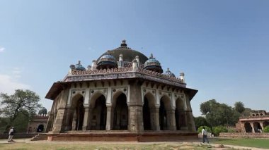 New Delhi, India - February 28 2025: Architecture view of Humayun's tomb ancient building with tourists. The tomb of Mughal Emperor Humayun is a popular historical site in delhi to visit.