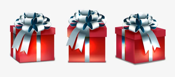 Realistische drei rote Geschenke auf weißem Hintergrund — Stockvektor