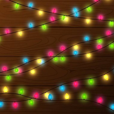 Işıklı çelenklerle ahşap arkaplan