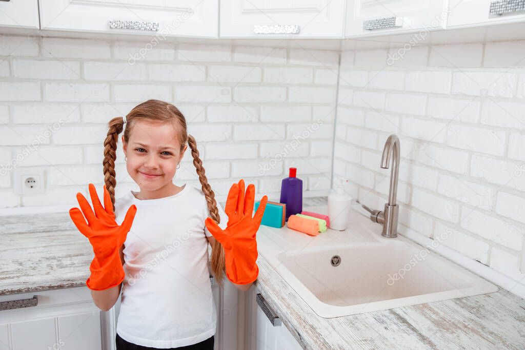 Chores for children. Girl is going to wash dishes