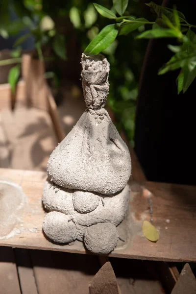 Clay doll. Used for decorating the garden or the living area of the house. gnome with his own hands. dwarves and garden figures made of clay. — Stock Image Clay Doll Used Decorating Garden Living Area House Gnome His Royalty Free Stock Images