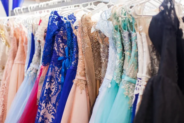 Lot Elegant Evening Dresses Hang Counter Store — Stock Photo, Image