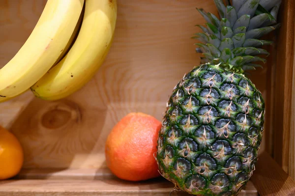 composition of exotic tropical fruit in a wooden box