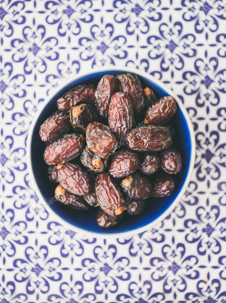 Dates over typical oriental ornamental painted background