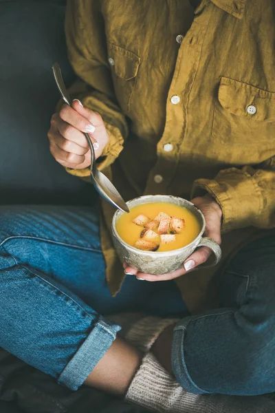 Female Yellow Shirt Jeans Sitting Eating Fall Warming Yellow Pumpkin — Stock Photo, Image