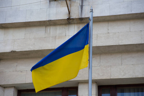 National flag of independent Ukraine waving in the wind