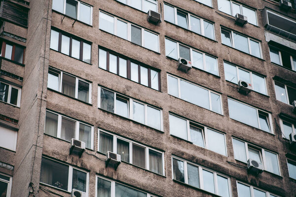 Glass windows of an office building in a modern city in the financial district