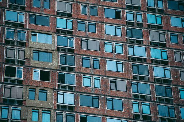 Glass windows of an office building in a modern city in the financial district
