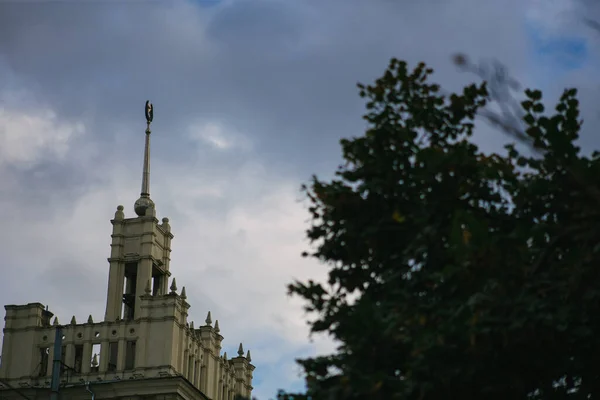 House with a spire in the Stalinist Empire style in the center of kharkov