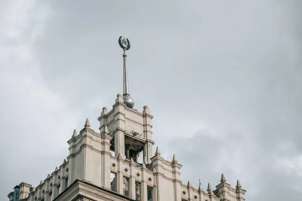 House with a spire in the Stalinist Empire style in the center of kharkov