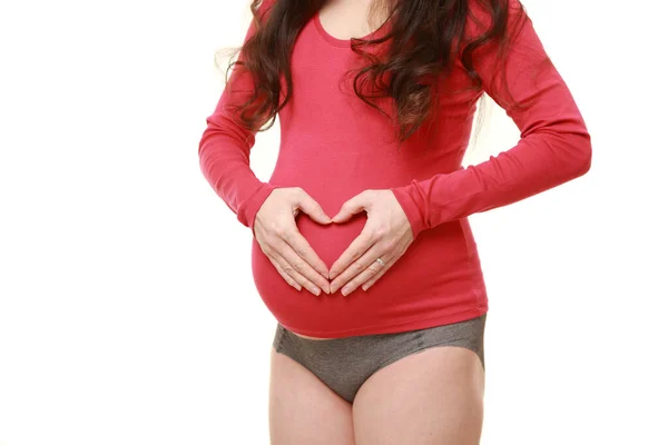 Femme Enceinte Faisant Forme Coeur Avec Ses Mains — Photo