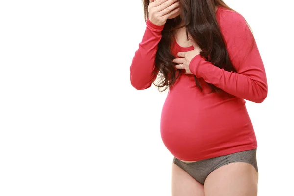 妊娠中の女性は嘔吐のように — ストック写真