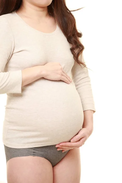 Woman Touching Her Growing Pregnant Belly — Stock Photo, Image