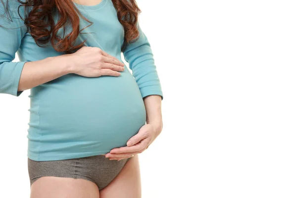 Vrouw Aanraken Van Haar Groeiende Zwangere Buik — Stockfoto