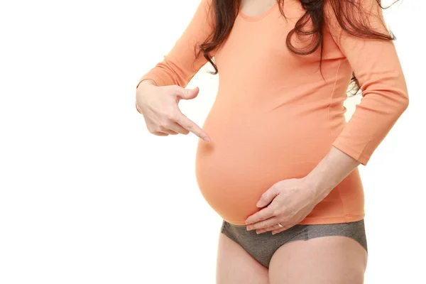 Mulher Grávida Apontando Para Estômago — Fotografia de Stock