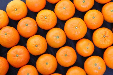 meyve narenciyesi tankan karesi siyah arkaplanda