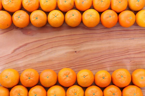 Citrus Tankan Telaio Sfondo Legno — Foto Stock