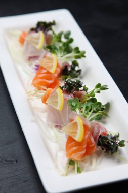 Kırmızı balık ve somon carpaccio.