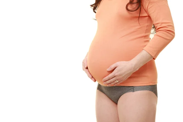 Frau Berührt Ihren Wachsenden Schwangerschaftsbauch — Stockfoto