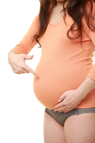 Mujer Embarazada Señalando Estómago — Foto de Stock