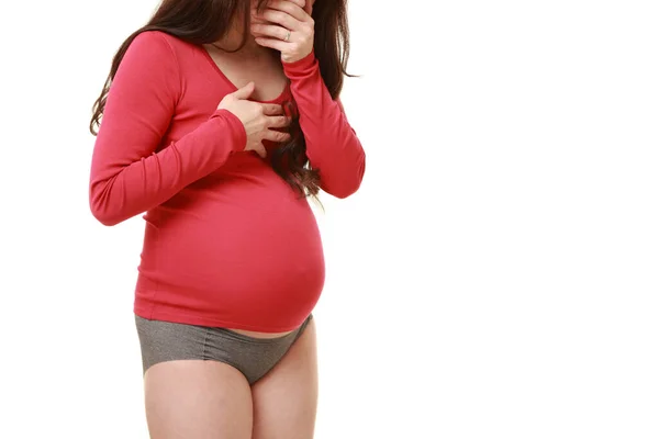 妊娠中の女性は白い背景に隔離された嘔吐のように感じ — ストック写真