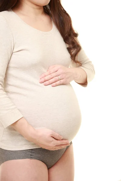 Mujer Tocando Creciente Vientre Embarazada — Foto de Stock