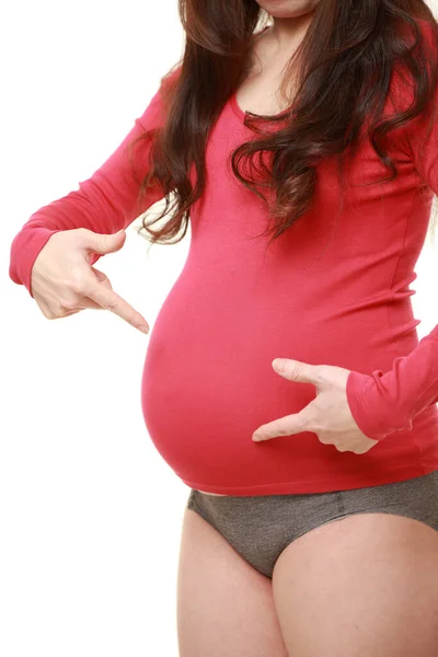 Mujer Embarazada Señalando Estómago — Foto de Stock