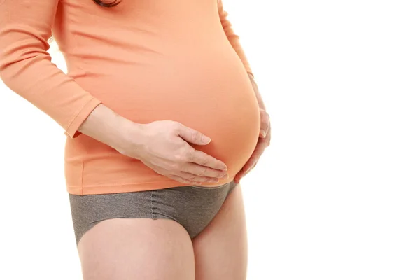 Woman Touching Her Growing Pregnant Belly — Stock Photo, Image