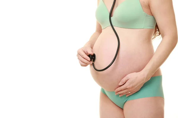 Pregnant Woman Listen Belly Stethoscope Royalty Free Stock Photos