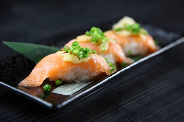 Lightly Broiled Salmon Cheese Sushi Stock Image