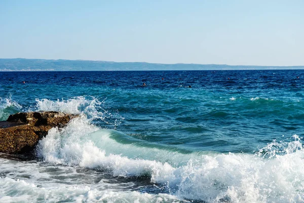 blue adriatic sea water burst on rocks, croatia split wallpaper, stormy weather