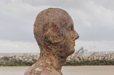 Another Place art installation by Antony Gormley clipart