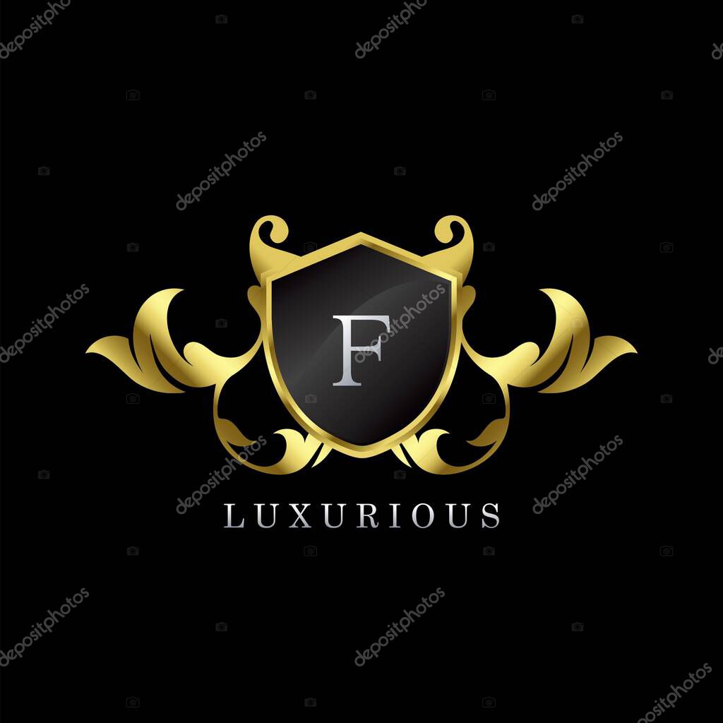 Golden Luxury Shield F Letter Logo. Elegance logo vector template made of wide silver alphabet font on shield frame ornate luxury style.