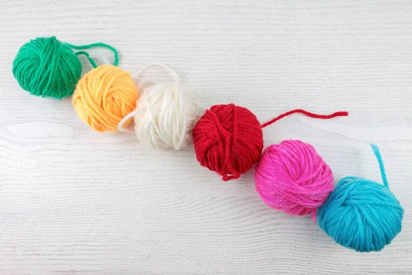 Colorful Cotton Balls on White Background.