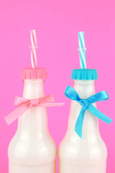 Bottle of Milk on Colored Background.
