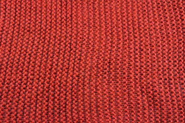 ニット ウール スカーフ背景が赤 — ストック写真