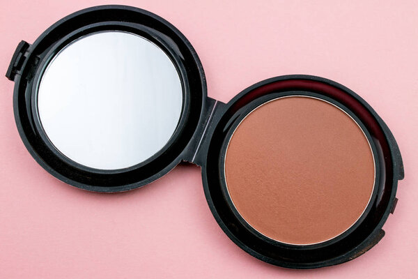 Makeup Blush Powder with mirror on Pink Background