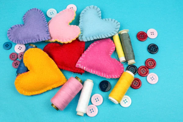 Top View Colorful Felt Hearts Threads Buttons Blue Background — Stock Photo, Image