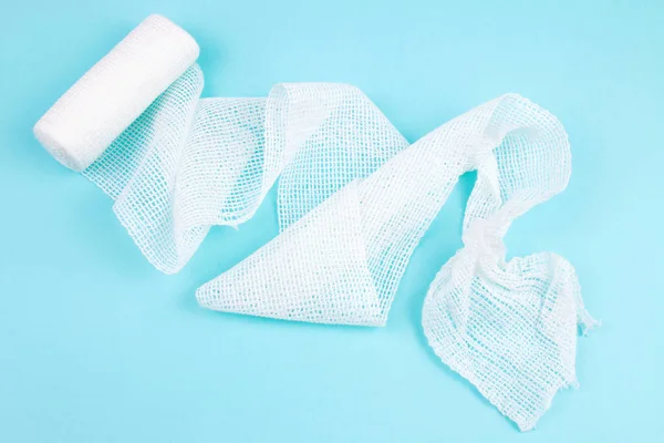 close-up shot of White bandage on blue background